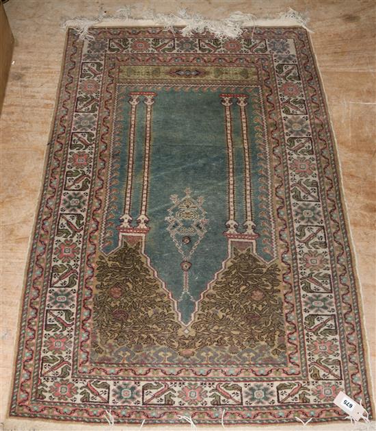 A Persian blue ground prayer rug
